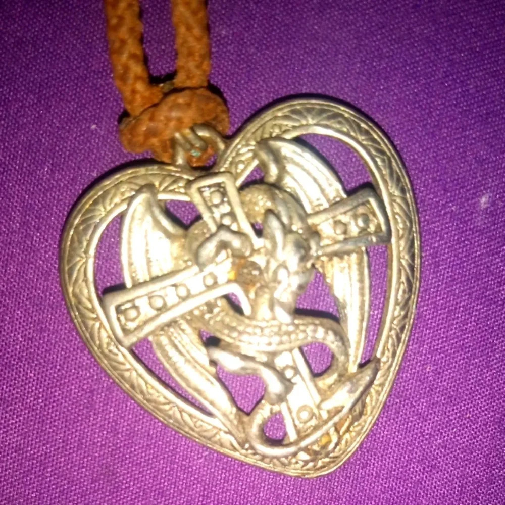 Midevil Style Dragonheart Silvertone Pendant on Brown Cordage Necklace